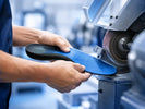 The Hidden Cost of Manual Grinding in Orthotics Labs — and How Digital Production Can Change the Equation - Qaadir - Ability for All