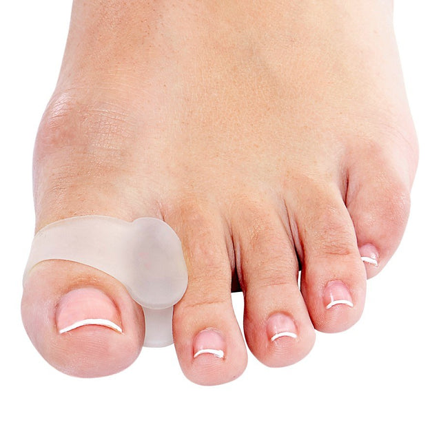 Qadam all-gel toe spreader with toe loop worn between the toes