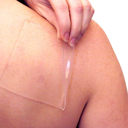Qadam Trim-to-Fit Self-Adhesive Silicone Gel Sheet with Clear Film Top that pads pressure points in shoes – product shot